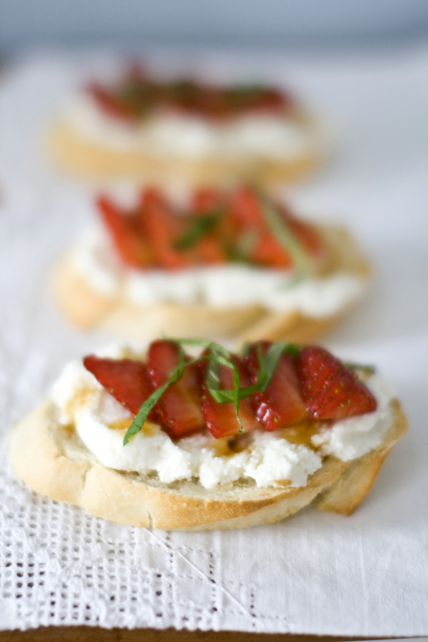 This March 21, 2011 photo shows strawberry-ricotta bruschetta in Concord, N.H. While these bruschetta are a natural fit as part of a breakfast or brunch, they make a fine passed appetizer as well.      (AP Photo/Matthew Mead)