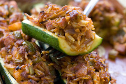 This June 6, 2011 photo shows jambalaya-stuffed zucchini in Concord, N.H.  This dish can be served with a green salad and a piece of crusty French bread to round out the meal.     (AP Photo/Matthew Mead)