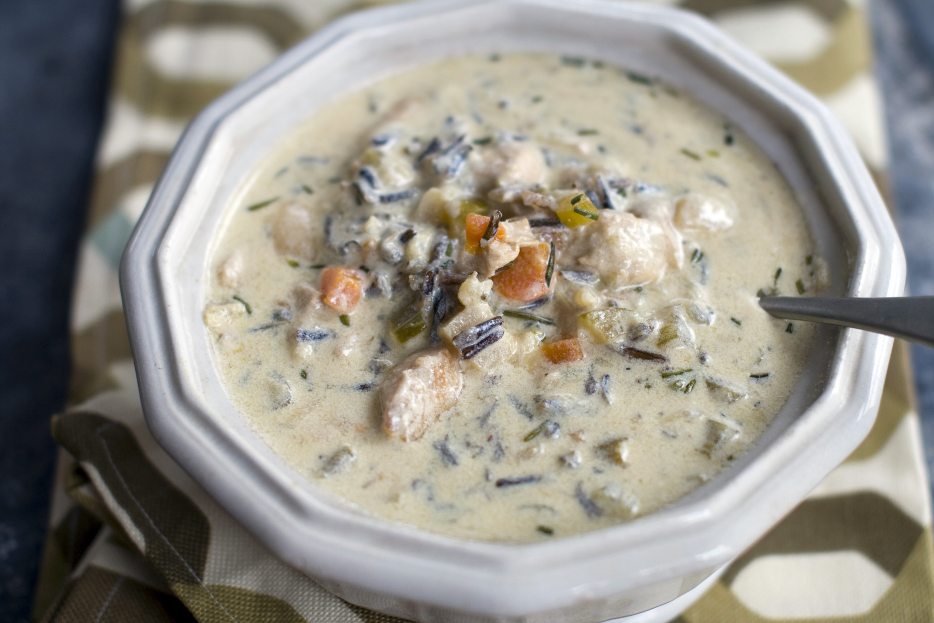This Nov. 14, 2011 photo shows creamy rosemary wild rice soup in Concord, N.H. Creamy in texture without being cream-based, this soup satisfies with vegetables, wild rice and rosemary.    (AP Photo/Matthew Mead)