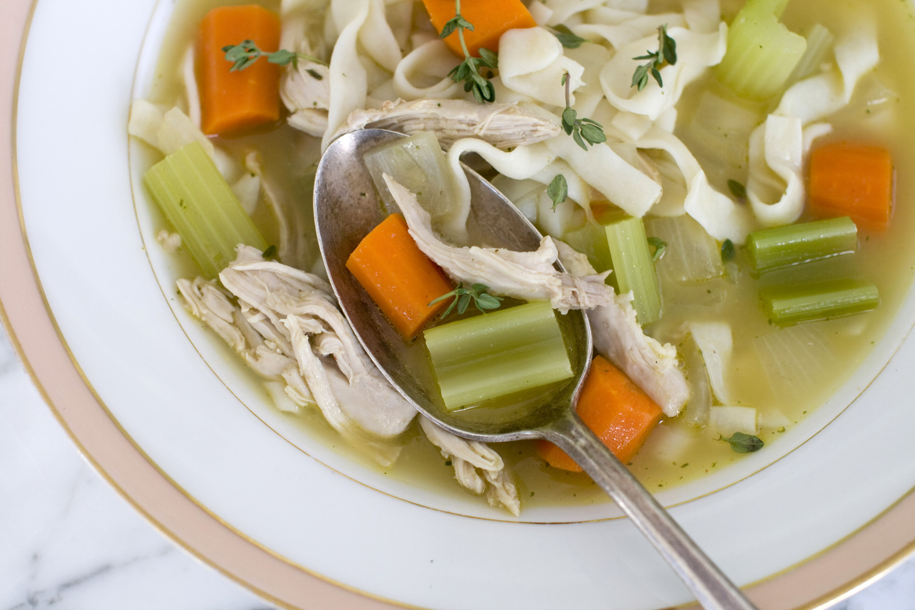 This Nov. 21, 2011 photo shows Rocco DiSpirito's recipe for chicken noodle soup in Concord, N.H. This soup uses real chicken and fresh vegetables, like carrots and onions, which are a great source of vitamins.    (AP Photo/Matthew Mead)