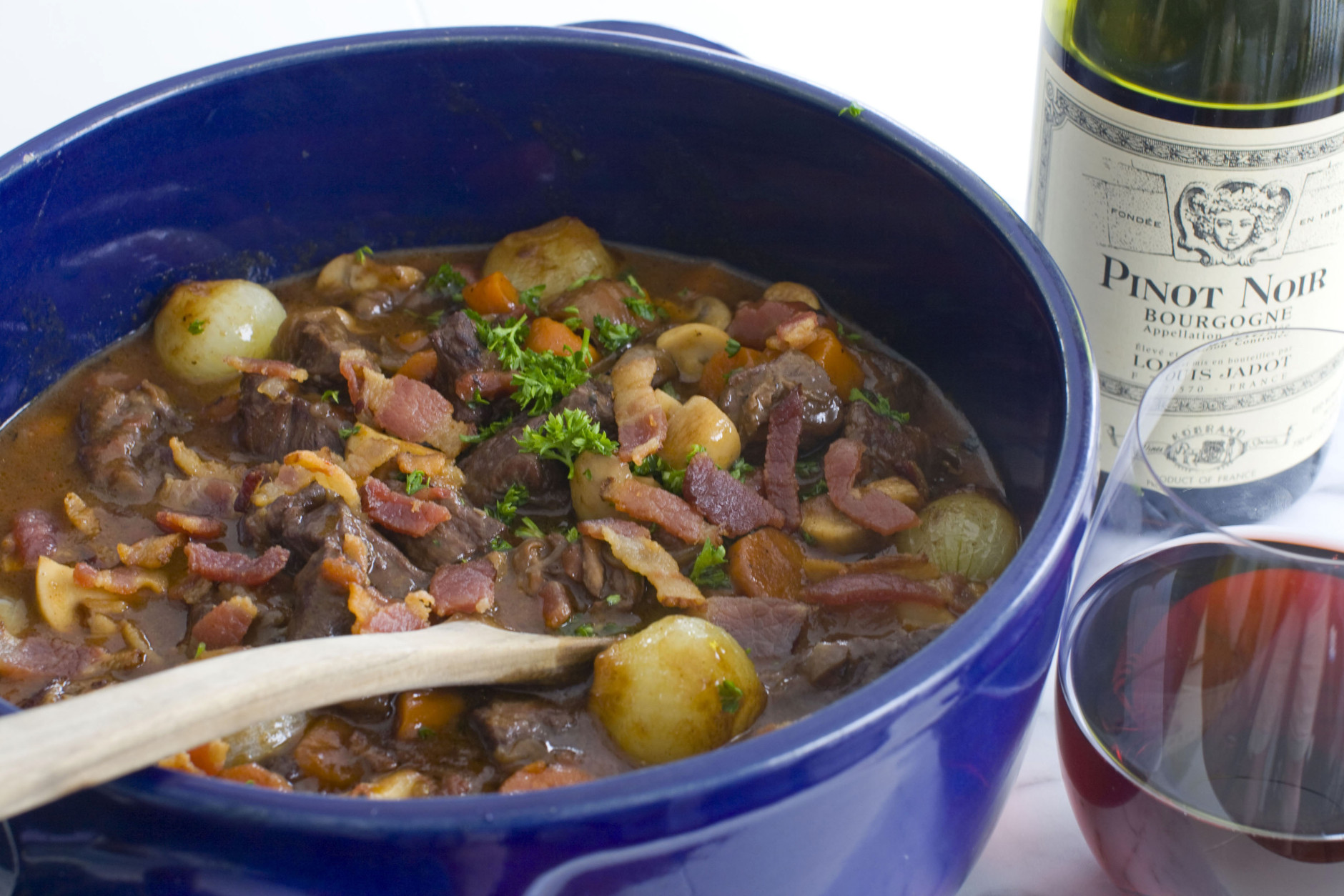 In this image taken on April 23, 2012, Julia Child's beef bourguignon recipe is paired with a pinot noir as seen in Concord, NH. (AP Photo/Matthew Mead)