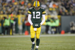 Green Bay Packers' Aaron Rodgers walks off the field during the second half an NFL football game against the Minnesota Vikings Sunday, Jan. 3, 2016, in Green Bay, Wis. (AP Photo/Matt Ludtke)