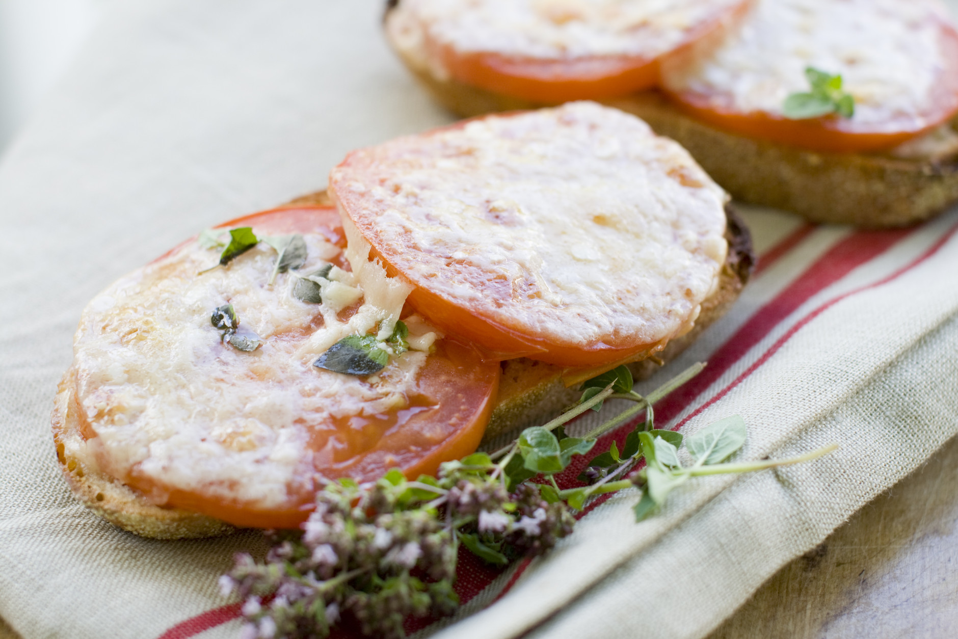 This July 15, 2013 photo shows toasted Parmesan tomato bread in Concord, N.H. (AP Photo/Matthew Mead)