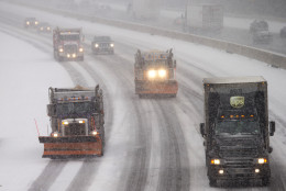 Snow plows and traffic make their way north along Interstate 95 as snow begins to fall in Ashland, Va., Friday, Jan. 22, 2016. (AP Photo/Steve Helber)