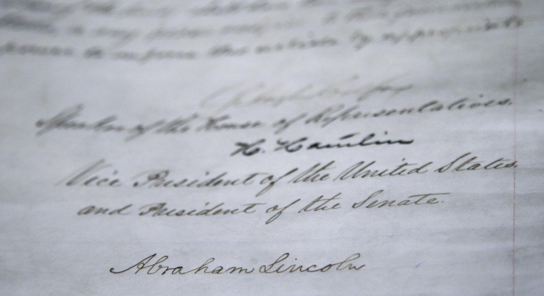 The signature of President Abraham Lincoln is seen on the 13th Amendment in a display at the Tennessee State Museum on Monday, Feb. 11, 2013, in Nashville, Tenn. The 13th Amendment, which abolished slavery, is on display along with the Emancipation Proclamation as part of an exhibit titled  Discovering the Civil War. (AP Photo/Mark Humphrey)