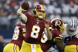 Washington Redskins quarterback Kirk Cousins (8) looks to pass under pressure in the first half of an NFL football game against the Dallas Cowboys on Sunday, Jan. 3, 2016, in Arlington , Texas. (AP Photo/Tim Sharp)