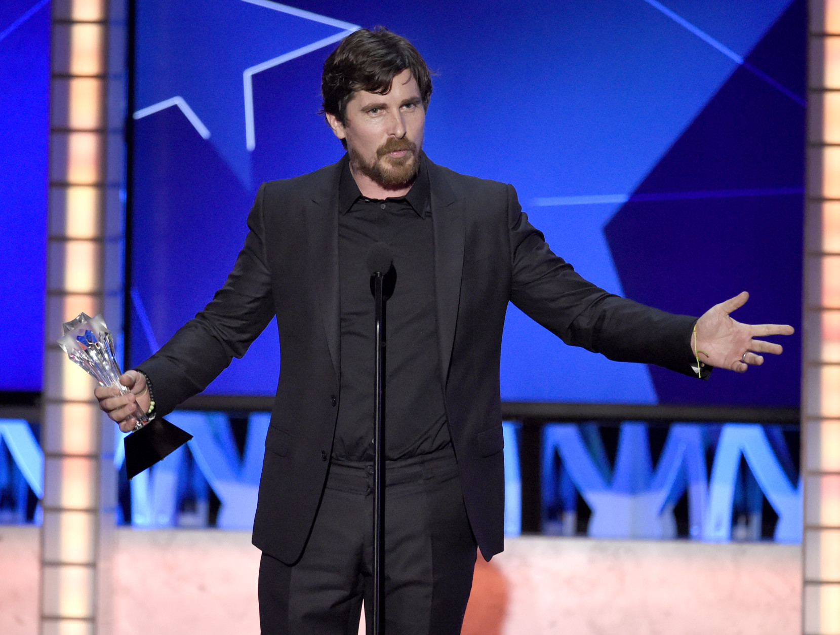 Christian Bale accepts the award for best actor in a comedy for The Big Short at the 21st annual Critics' Choice Awards at the Barker Hangar on Sunday, Jan. 17, 2016, in Santa Monica, Calif. (Photo by Chris Pizzello/Invision/AP)