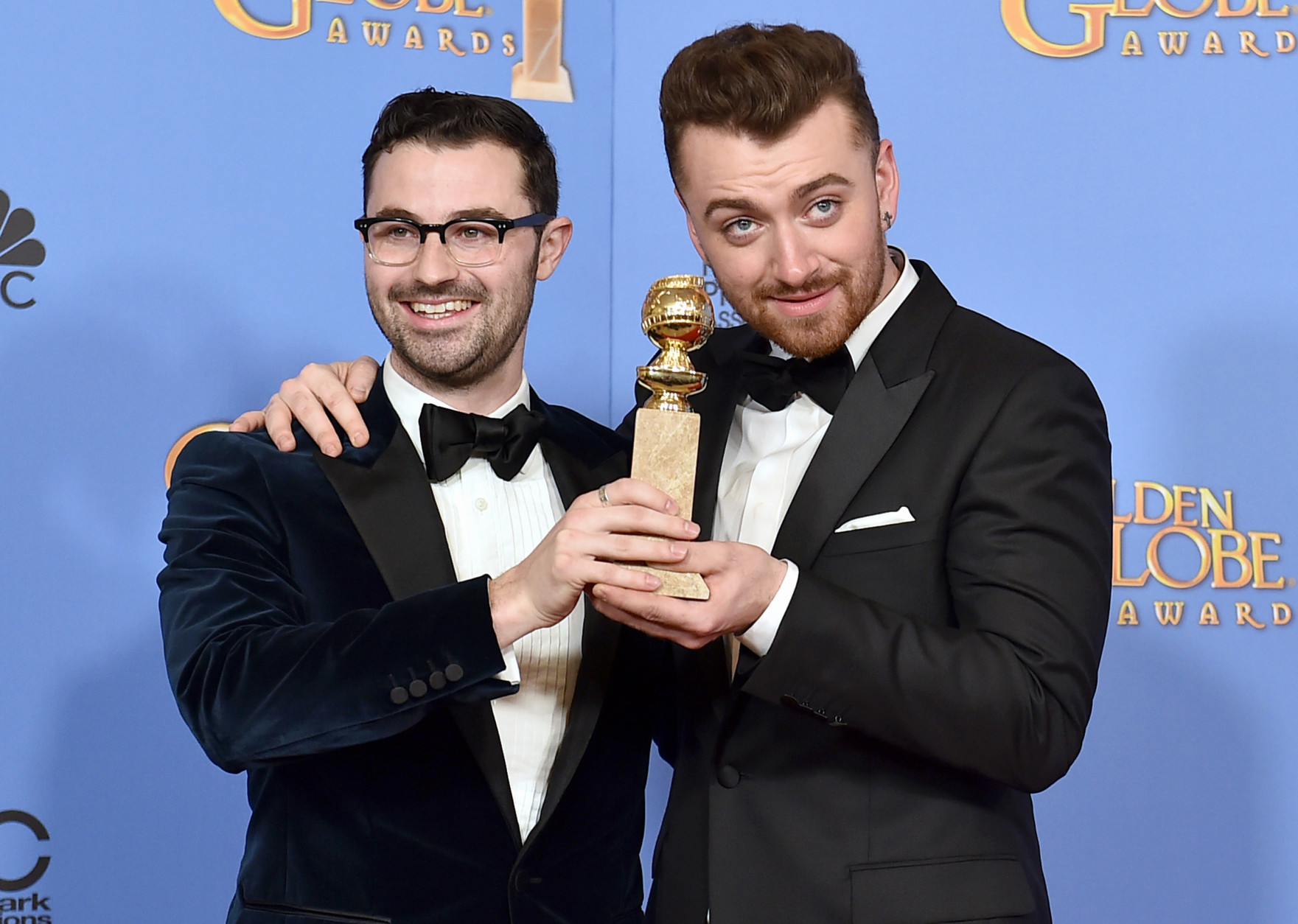 Jimmy Napes, left, and Sam Smith pose in the press room with the award for best original song in a motion picture for Writings on the Wall from Spectre" at the 73rd annual Golden Globe Awards on Sunday, Jan. 10, 2016, at the Beverly Hilton Hotel in Beverly Hills, Calif. (Photo by Jordan Strauss/Invision/AP)