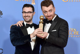 Jimmy Napes, left, and Sam Smith pose in the press room with the award for best original song in a motion picture for Writings on the Wall from Spectre" at the 73rd annual Golden Globe Awards on Sunday, Jan. 10, 2016, at the Beverly Hilton Hotel in Beverly Hills, Calif. (Photo by Jordan Strauss/Invision/AP)