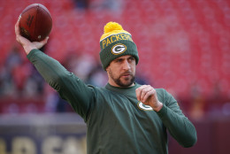 Green Bay Packers quarterback Aaron Rodgers (12) warms up before an NFL wild card playoff football game against the Washington Redskins in Landover, Md., Sunday, Jan. 10, 2016. (AP Photo/Alex Brandon)
