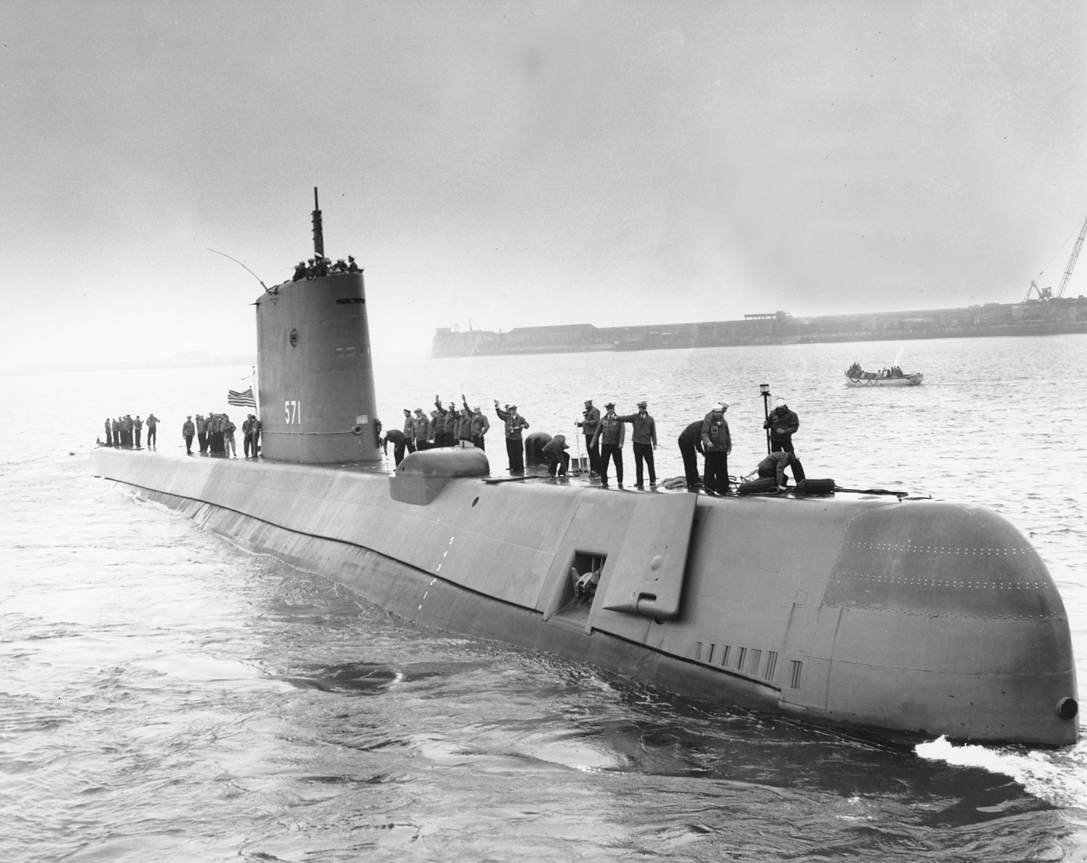 The U.S. Navy's nuclear-powered submarine USS Nautilus leaves for home at Portland, Dorset on Aug. 18, 1958.  (AP Photo)