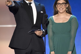 Jaime Camil, left, and Mayim Bialik speak on stage at the 21st annual Critics' Choice Awards at the Barker Hangar on Sunday, Jan. 17, 2016, in Santa Monica, Calif. (Photo by Chris Pizzello/Invision/AP)