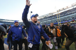 New York Giants head coach Tom Coughlin walks off the field after the Giants lost 35-30 to the Philadelphia Eagles in an NFL football game, Sunday, Jan. 3, 2016, in East Rutherford, N.J. (AP Photo/Julio Cortez)