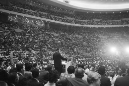 Rev. Martin Luther King Jr., speaks to an overflow crowd in Detroit?s Cobo Hall Arena on Sunday, June 24, 1963, following a ?Freedom March.?    An estimated 100,000 ?walkers? paraded to the hall through downtown Detroit and gathered in the hall and overflowed outside to hear him speak on the rights of Blacks.  (AP Photo)