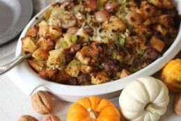 This Oct. 5, 2015, photo shows sausage and grape Thanksgiving stuffing in Concord, N.H. Making one giant batch of stuffing allows for some of it to be used to stuff the turkey, while the rest can be put into a well-buttered baking dish. (AP Photo/Matthew Mead)