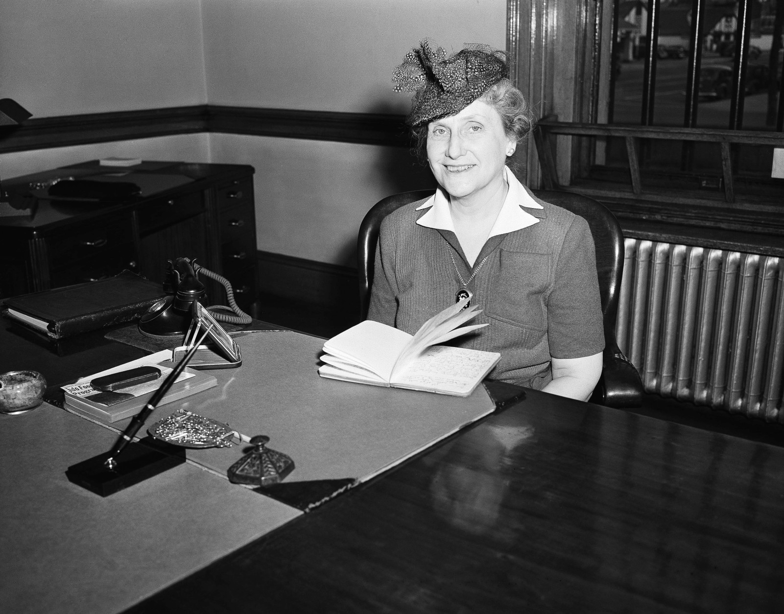 Mrs. Nellie Tayloe Ross Director of the U.S. Mint poses Dec. 1, 1942 in Denver. (AP Photo)