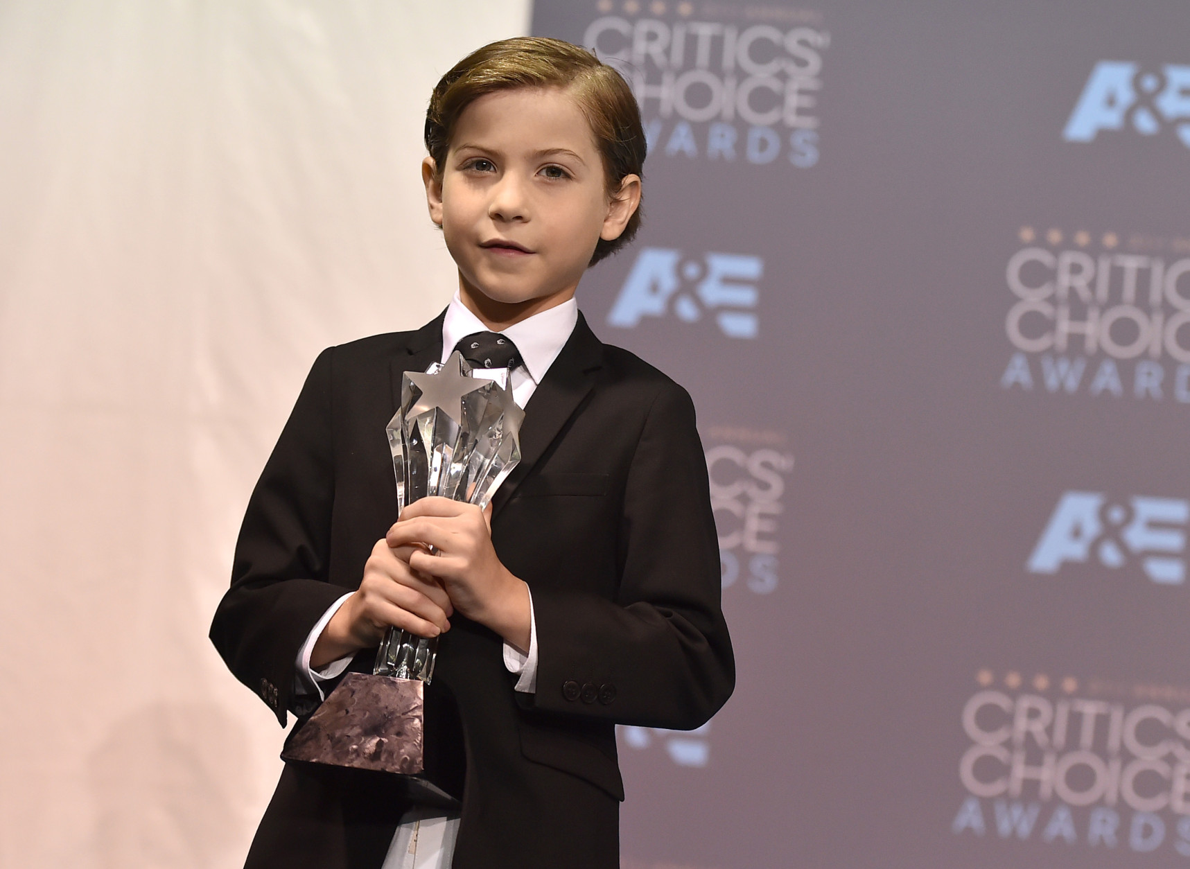 Jacob Tremblay poses in the press room with the award for best young actor/actress for Room at the 21st annual Critics' Choice Awards at the Barker Hangar on Sunday, Jan. 17, 2016, in Santa Monica, Calif. (Photo by Jordan Strauss/Invision/AP)