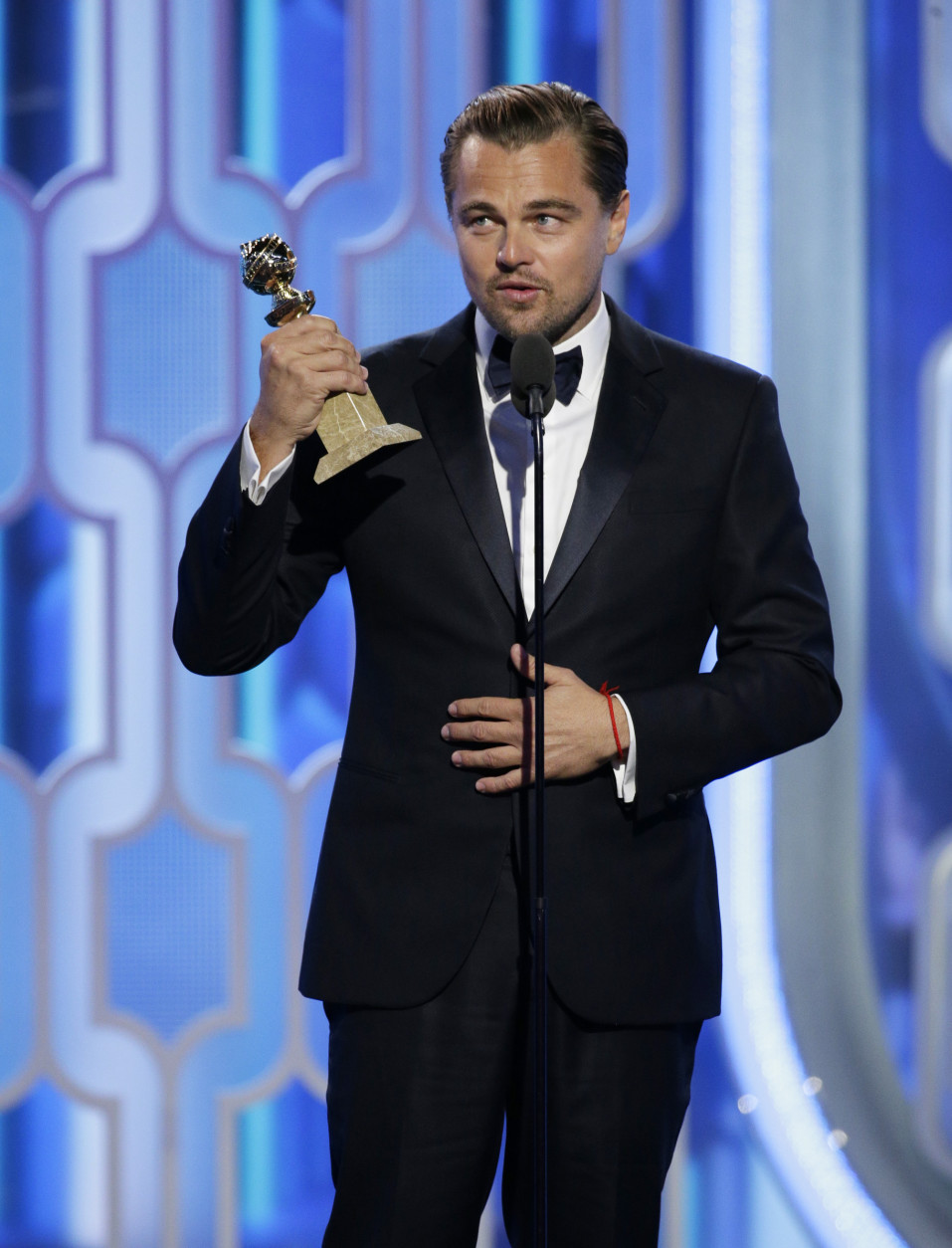 In this image released by NBC, Leonardo DiCaprio accepts the award for best actor in a motion picture drama for his role in "The Revenant" during the 73rd Annual Golden Globe Awards at the Beverly Hilton Hotel in Beverly Hills, Calif., on Sunday, Jan. 10, 2016. (Paul Drinkwater/NBC via AP)