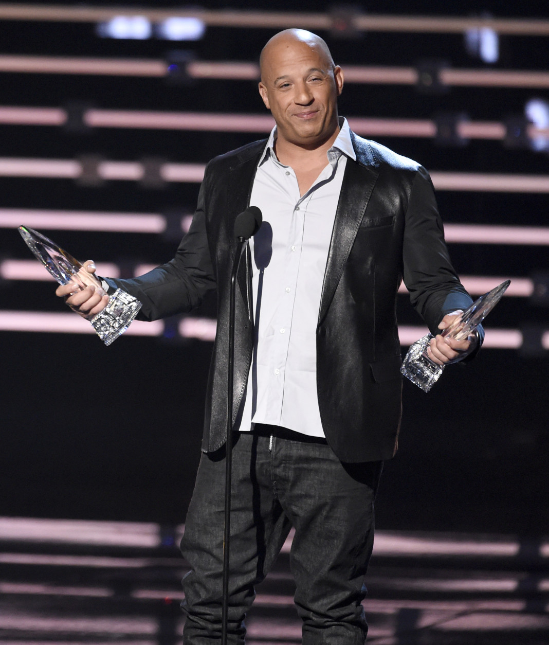 Vin Diesel accepts the award for favorite movie for Furious 7 at the People's Choice Awards at the Microsoft Theater on Wednesday, Jan. 6, 2016, in Los Angeles. (Photo by Chris Pizzello/Invision/AP)