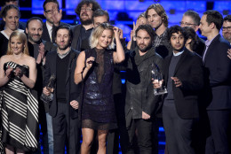 Kaley Cuoco, center, and the cast and crew of "The Big Bang Theory" accept the award for favorite network tv comedy at the People's Choice Awards at the Microsoft Theater on Wednesday, Jan. 6, 2016, in Los Angeles. (Photo by Chris Pizzello/Invision/AP)