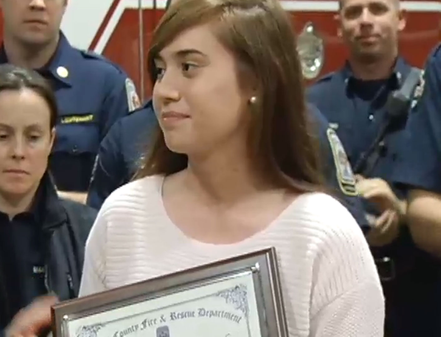 Va. 19-year-old honored for lifting truck off father, stopping fire
