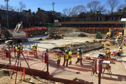 As soon as something of historic significance is discovered on a work site the developer and city negotiate a new contract to assure all relevant finds are recovered. (WTOP/Kristi King)