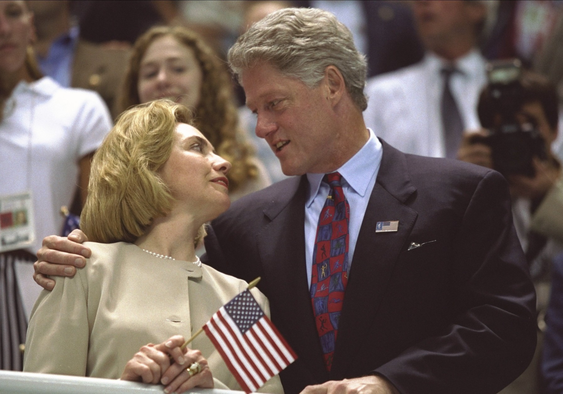 25 Jul 1996:  Hillary Clinton, left, and Bill Clinton look to one another as the USA women's 4x200m freestyle relay team wins the gold medal at the Georgia Tech Aquatic Center at the 1996 Centennial Olympic Games in Atlanta, Georgia.  Mandatory Credit: Simon Bruty  /Allsport
