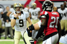ATLANTA, GA - JANUARY 03:  Drew Brees #9 of the New Orleans Saints signals to his teammates at the line of scrimmage during the first half against the Atlanta Falcons at the Georgia Dome on January 3, 2016 in Atlanta, Georgia.  (Photo by Scott Cunningham/Getty Images)