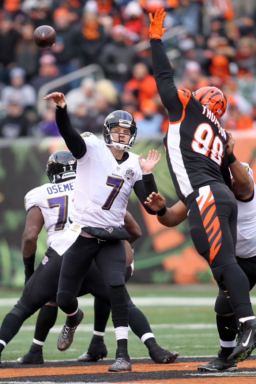 CINCINNATI, OH - JANUARY 3:  Brandon Thompson #98 of the Cincinnati Bengals attempts to block a pass thrown by Ryan Mallett #7 of the Baltimore Ravens during the game at Paul Brown Stadium on January 3, 2016 in Cincinnati, Ohio. (Photo by John Grieshop/Getty Images)