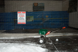 A salt spreader sits in front of the shuttered Georgia Ave.-Petworth metro station on January 23, 2016 in Washington, DC. Over a foot of snow has already fallen in the city in the past 24 hours, in what experts say could be a record-breaking storm.  (Photo by Allison Shelley/Getty Images)