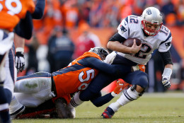 DENVER, CO - JANUARY 24:  Tom Brady #12 of the New England Patriots is sacked by  Von Miller #58 of the Denver Broncos in the second quarter in the AFC Championship game at Sports Authority Field at Mile High on January 24, 2016 in Denver, Colorado.  (Photo by Ezra Shaw/Getty Images)