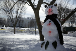 A snowman stands in Lafayette Square in the front of the White House January 25, 2016 in Washington, DC.  Winter Storm Jonas hit the East Coast over the weekend, breaking snowfall records, causing 29 storm-related deaths, leaving thousands of homes without power and serious flooding in coastal areas.   (Photo by Alex Wong/Getty Images)