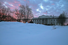 The early morning sun rises over the White House that is covered with snow on January 26, 2016 in Washington, DC. The east coast was still digging out from large storm that hit the East Coast, breaking snowfall records, causing 29 storm-related deaths, and serious flooding in coastal areas.  (Photo by Mark Wilson/Getty Images)
