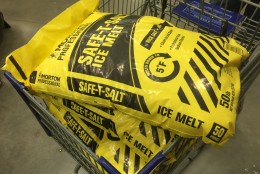 Sodium Chloride(pictured) also known as rock salt can damage asphalt, concrete, brick, stone, metal, grass, plants and wood decks and can be lethal to pets if ingested. An evaluation of various types of ice-melt by 
http://www.consumerreports.org/cro/2014/02/best-ice-melts/index.htm
Consumer Reports finds Magnesium Chloride, Potasium Chloride and Urea/Carbonly Diamide are best for gardeners and pet owners. 