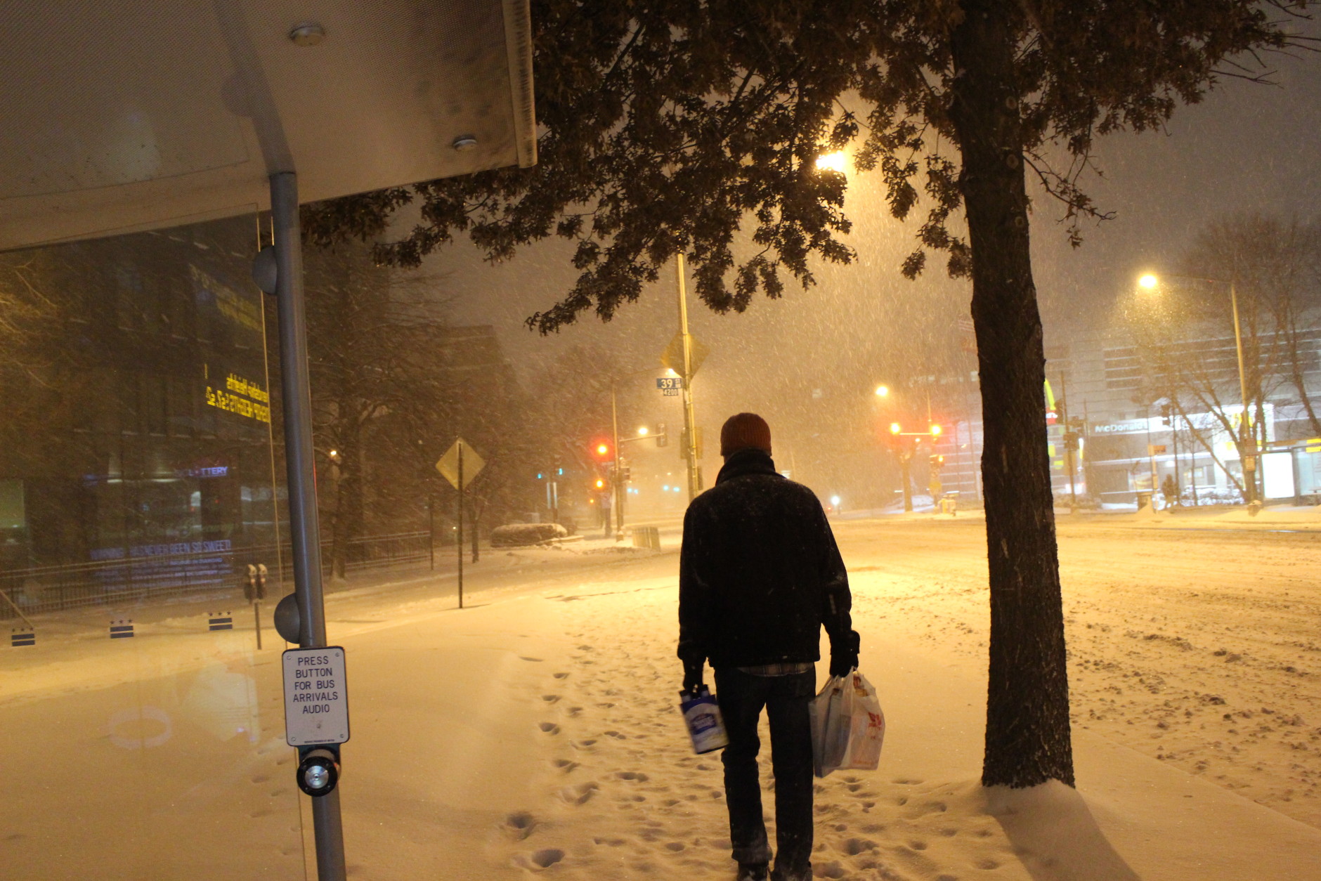 Some D.C. residents braved the snowy weather to grab essential groceries-- and a six-pack. (WTOP/Dana Gooley)