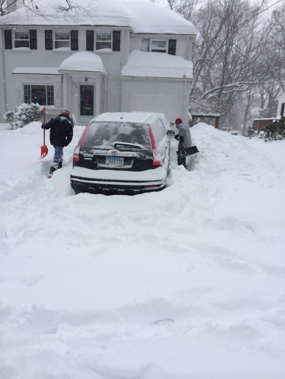 Kevin Hatcher and Aaron Bratt anticpate earning at least $100 digging people out of the snow on Saturday, Jan. 23, 2016 (WTOP/Dick Uliano)