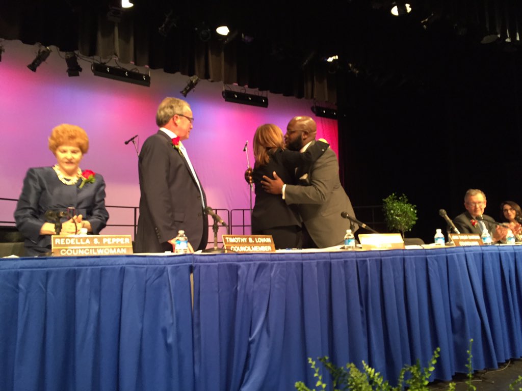 After taking the oath of office, Silberberg received hugs and applause. (WTOP/Michelle Basch)