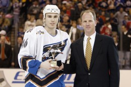 SUNRISE, FL - FEBRUARY 1:  Brian Sutherby #46 of the Washington Capitals is awarded the MVP of the NHL YoungStars game by Peter Sawkins, Director of Sports Marketing for the Topps Company on February 1, 2003 at the Office Depot Center in Sunrise, Florida. The East defeated the West 8-3. (Photo by Elsa/Getty Images/NHLI)