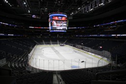 A zamboni prepares the ice in and empty Verizon Center before an NHL hockey game between the Washington Capitals and the Buffalo Sabres, Wednesday, Dec. 30, 2015, in Washington. The Capitals won 5-2. (AP Photo/Carolyn Kaster)