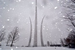 The U.S. Air Force Memorial gets its first inch of snow as a major storm moves into the D.C.-Metro region on Friday, Jan. 22, 2016 (WTOP/Dave Dildine)