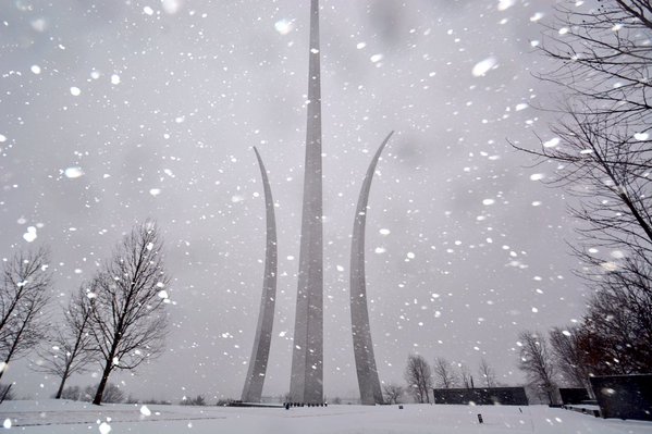 The U.S. Air Force Memorial gets its first inch of snow as a major storm moves into the D.C.-Metro region on Friday, Jan. 22, 2016 (WTOP/Dave Dildine)