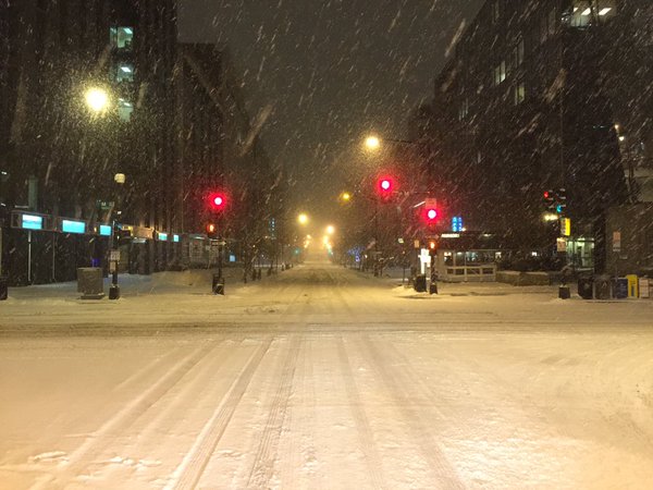 Inches of snow blanket the intersection of 19th and M Northwest in Washington, D.C. on Friday, Jan. 22, 2016. (From TWitter user reza mobayen)