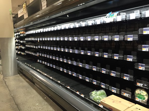The salad section at this Northwest D.C. Giant supermarket is bare as a major winter storm moves in Friday, Jan. 22, 2016. (WTOP/Max Smith)