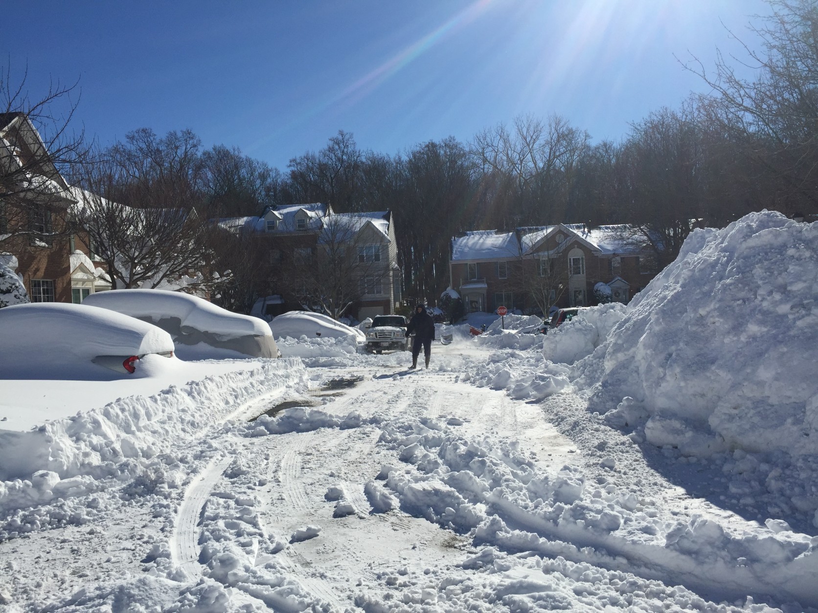 Mounds of snow are piled up in Germantown, Maryland as folks dig out.  (WTOP/Mike Jakaitis)