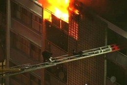 Fire crews fought a blaze and rescued residents at a fire in the 9200 block of New Hampshire Avenue in Adelphi Wednesday. (Courtesy NBC Washington)