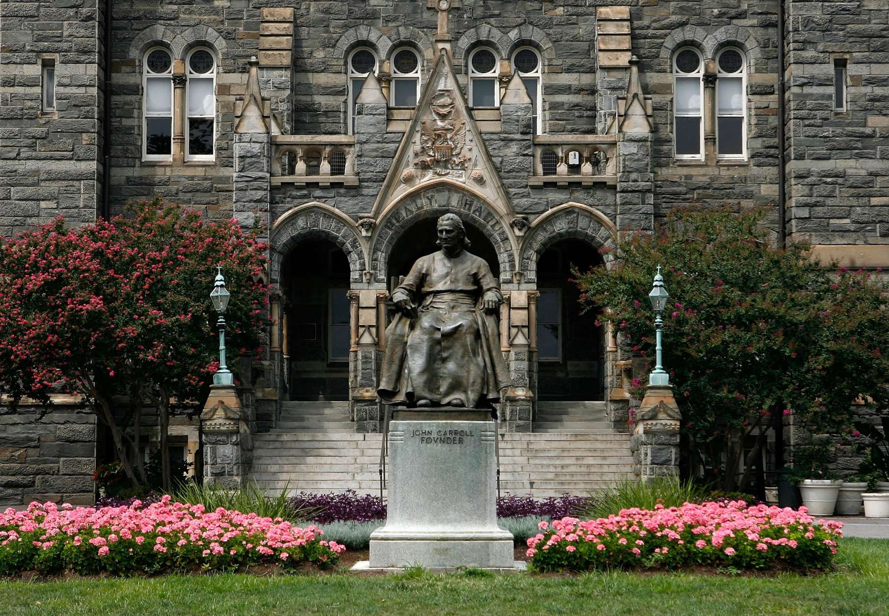WASHINGTON - AUGUST 15:  A statue of John Carroll, founder of Georgetown University, sits before Healy Hall on the school's campus Aug. 15, 2006 in Washington, D.C. Georgetown University was founded in 1789 and it is the oldest Catholic and Jesuit university in the U.S.  (Photo by Alex Wong/Getty Images)
