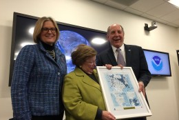 Sen. Barbara Mikulski is Vice Chairwoman of Commerce, Justice, Science Appropriations Subcommittee, which funds NOAA and worked to assure funding for the news supercomputer. Set to retire this year, she receives the forecast from her first day in office in the U.S. House of Representatives in 1987 from NOAA Administrator Dr. Kathryn Sullivan and NOAA Assistant Administrator for Weather Services Dr. Louis Uccellini. (WTOP/Kristi King)