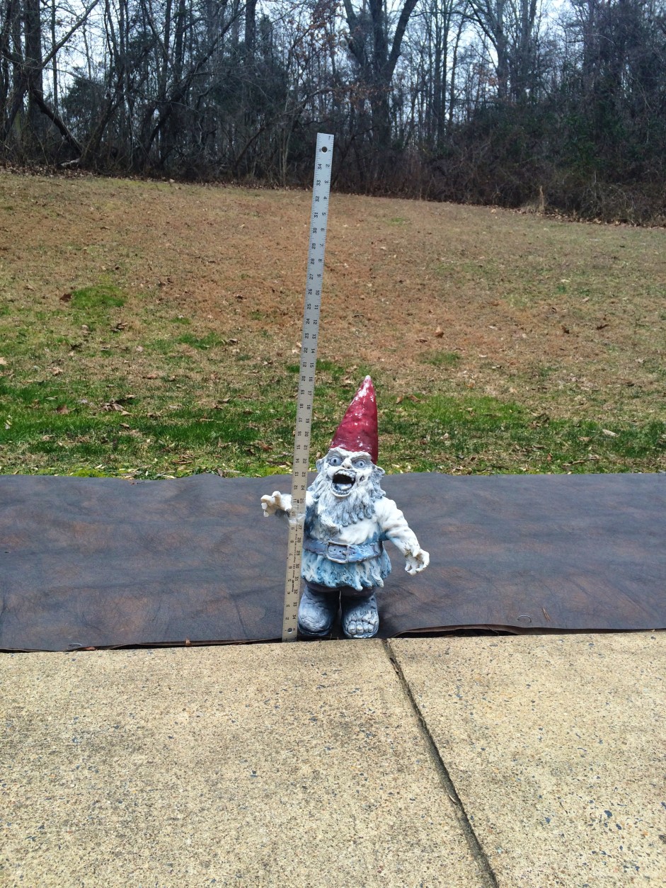 A garden gnome gets ready to measure the impending snow. (Courtesy Meg Casey)