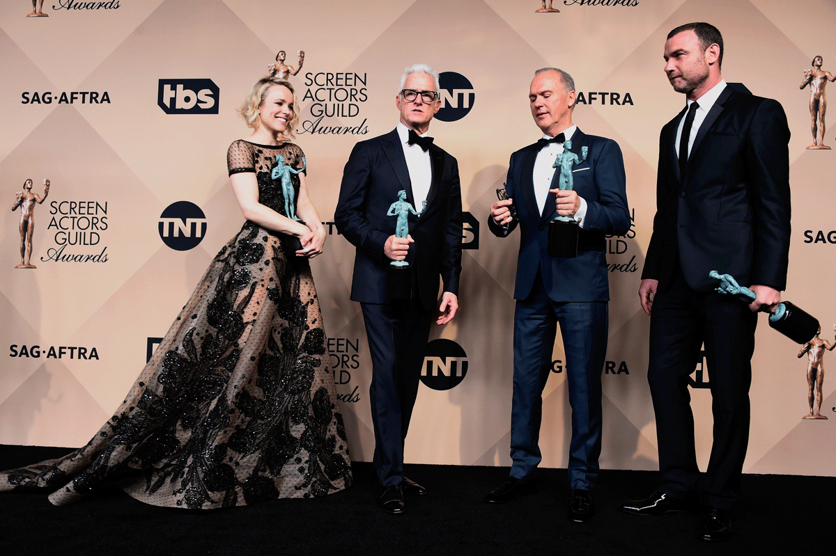  (L-R) Actors Rachel McAdams, John Slattery, Michael Keaton, and Liev Schreiber, winners for Outstanding Performance by a Cast in a Motion Picture 'Spotlight,' pose in the press room during the 22nd Annual Screen Actors Guild Awards at The Shrine Auditorium on January 30, 2016 in Los Angeles, California. (Photo by Frazer Harrison/Getty Images)