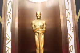 FILE - In this March 2, 2014 file photo, an Oscar statue appears at the Oscars at the Dolby Theatre in Los Angeles. Between Jan. 15, when Academy Award nominations are announced, and Feb. 22, film fans flock to the theaters to see the nominated works. On Feb. 21., AMC theaters will host 24-hour marathons for best-picture contenders in six busy movie markets around the country.  (Photo by Matt Sayles/Invision/AP, File)